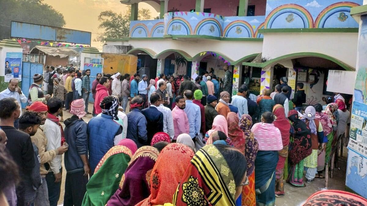 <div class="paragraphs"><p>People wait in a queue to cast votes at a polling station during the final phase of Jharkhand Assembly elections,. (Representative image)</p></div>