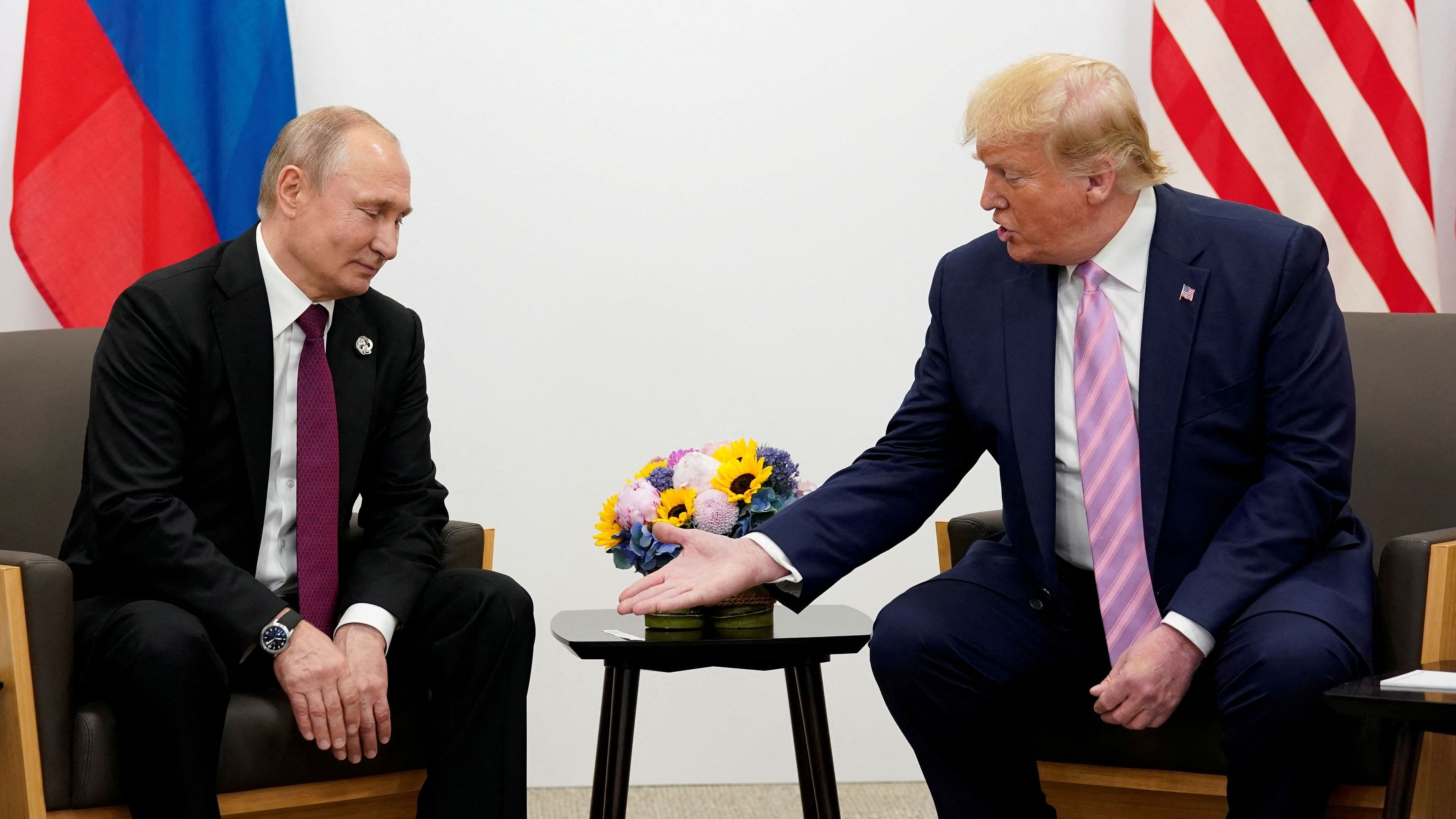 <div class="paragraphs"><p>Russian President Vladimir Putin (L) and US President-elect Donald Trump (R).</p></div>