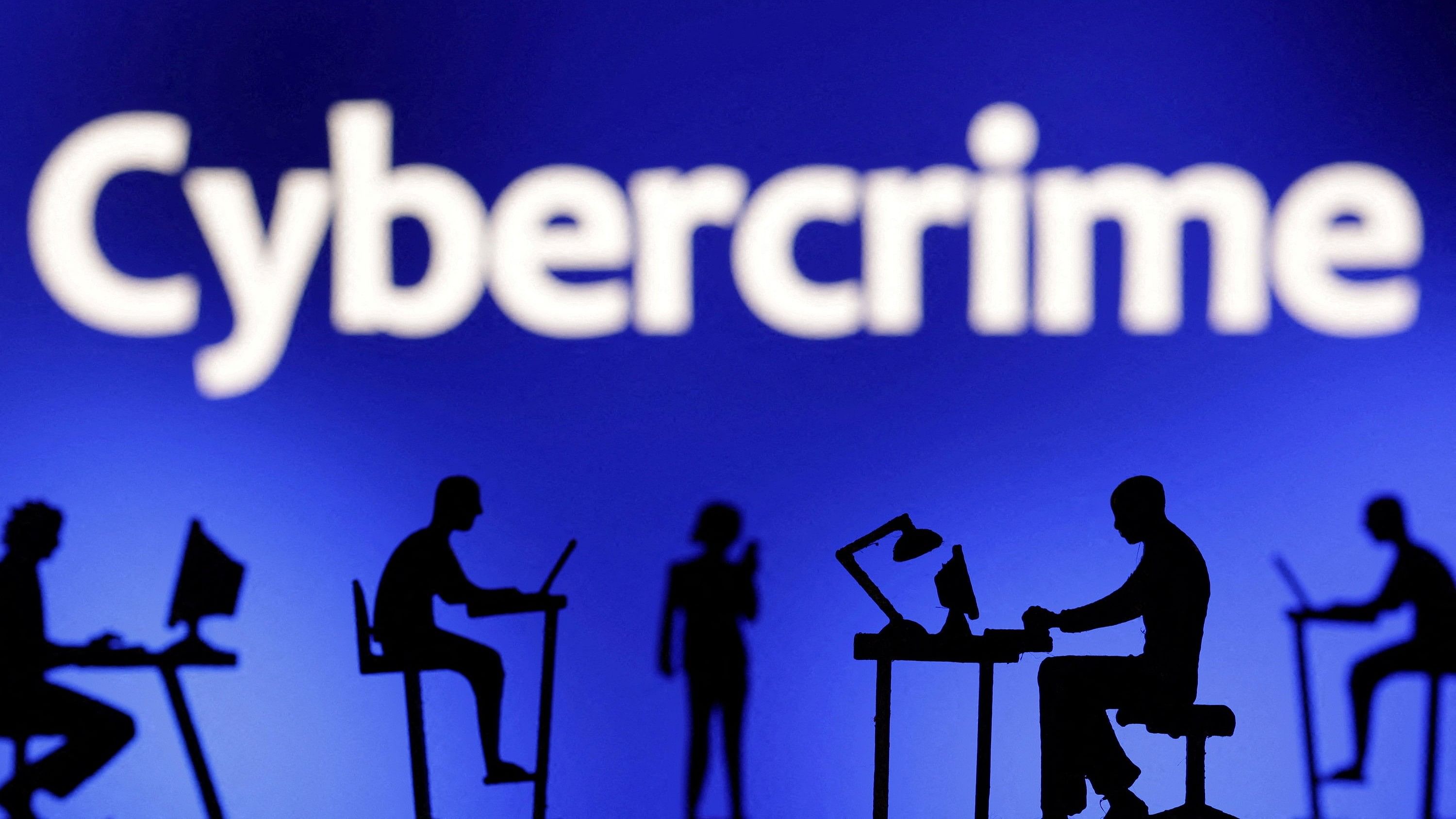 <div class="paragraphs"><p>FILE PHOTO: Figurines with computers and smartphones are seen in front the word "Cybercrime" in this illustration taken.</p></div>