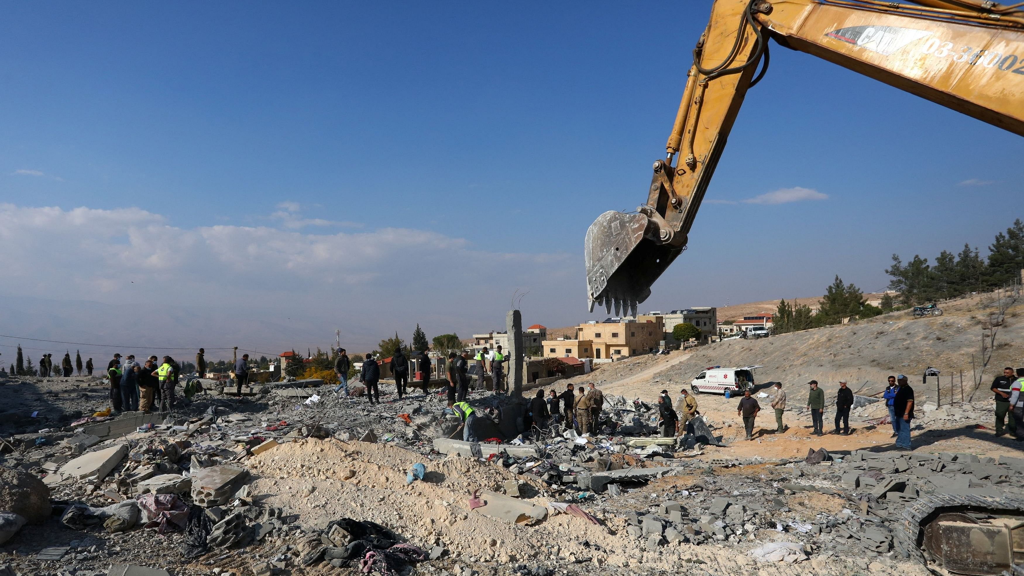 <div class="paragraphs"><p>An excavator operates at a site damaged in the aftermath of an Israeli strike on the town of Al-Ain in the Baalbek region, amid the ongoing hostilities between Hezbollah and Israeli forces, in Lebanon.</p></div>