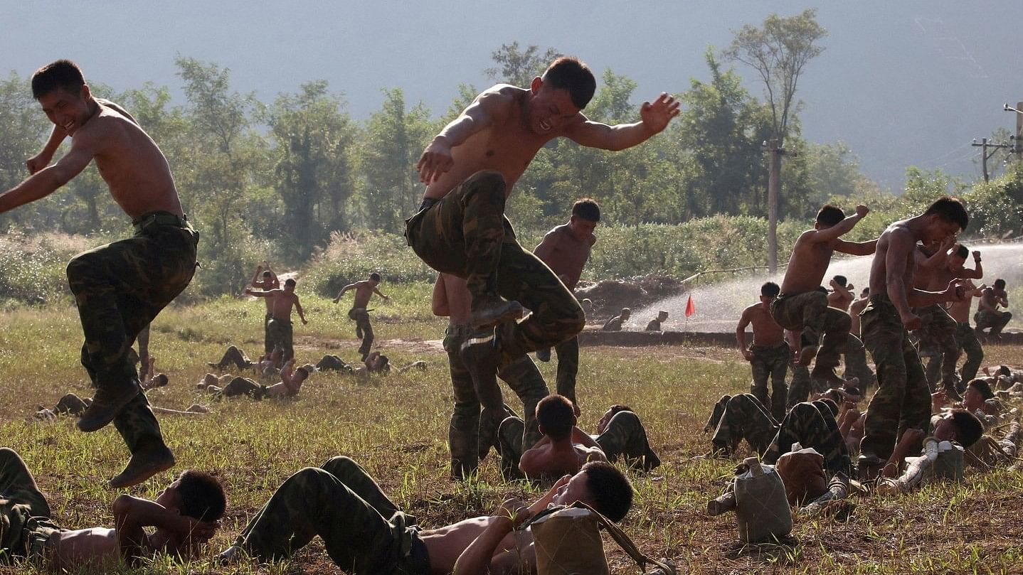 <div class="paragraphs"><p>Members of the special operations armed force of North Korea's army participate in a combatants drill during a visit by North Korean leader Kim Jong Un at an undisclosed location in North Korea.    </p></div>