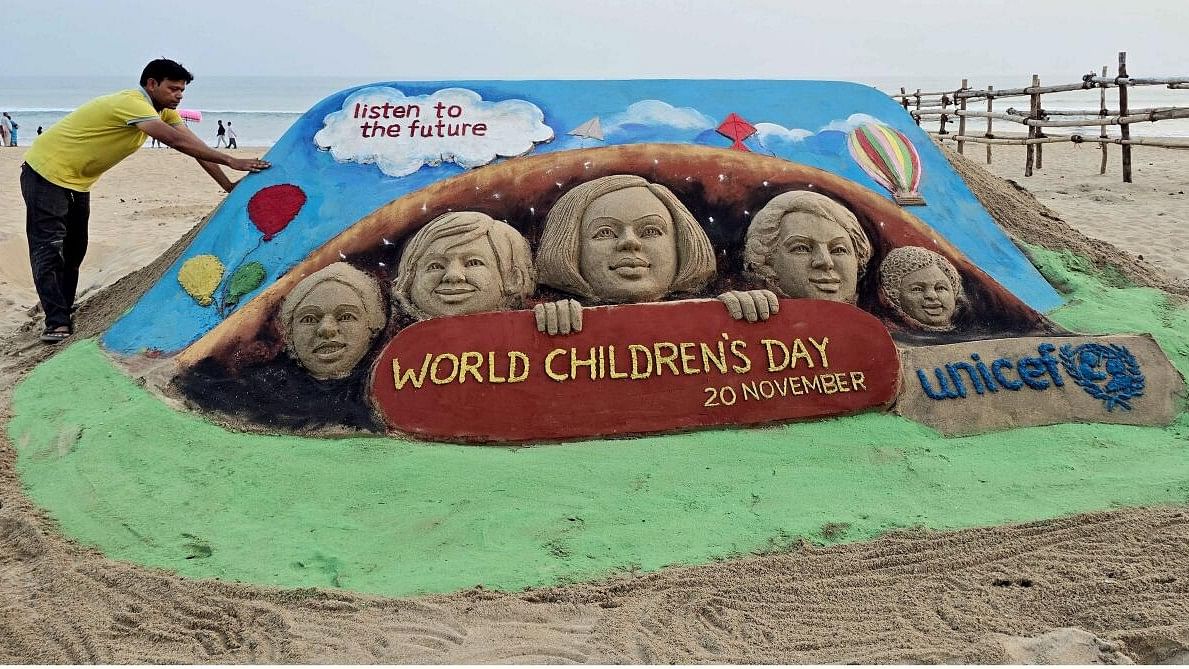 <div class="paragraphs"><p>Sand artist Manas Sahoo creates a sand sculpture on World Children's Day at Puri beach, Wednesday, Nov. 20, 2024.</p></div>