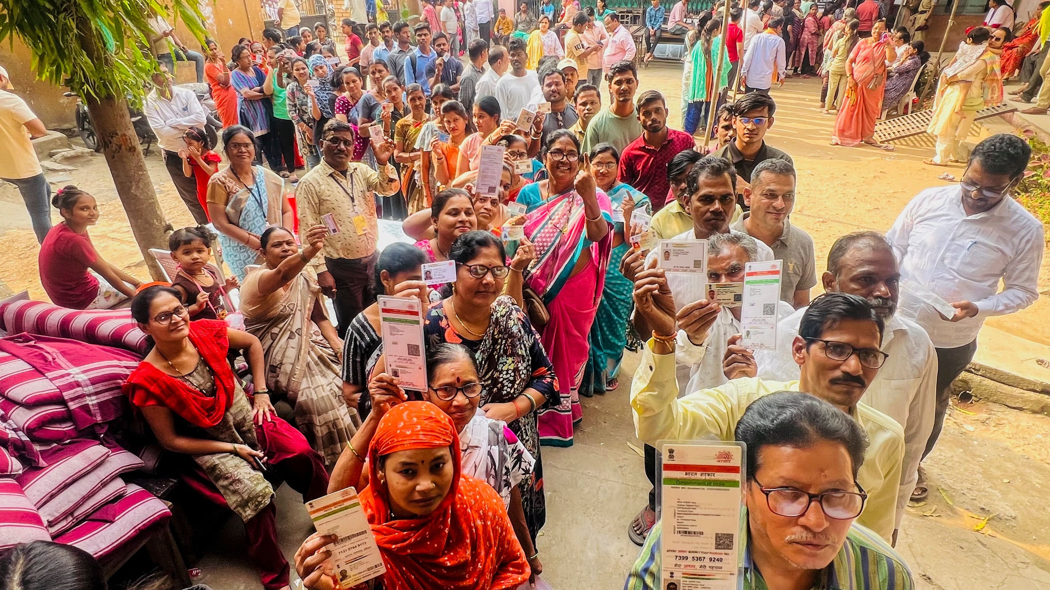 <div class="paragraphs"><p>Nagpur: cast their votes at a polling station during the Maharashtra Assembly elections, in Nagpur, Maharashtra, Wednesday, Nov. 20, 2024. </p></div>