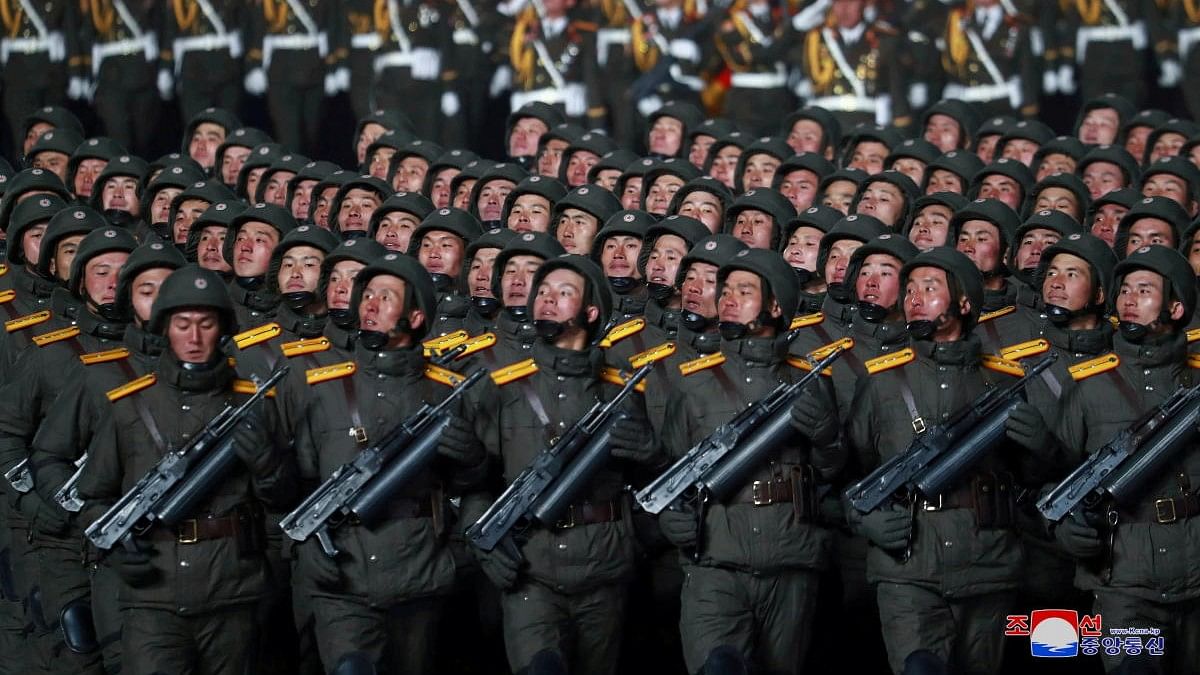 <div class="paragraphs"><p>Troops march during a military parade to commemorate the 8th Congress of the Workers' Party in Pyongyang, North Korea.</p></div>