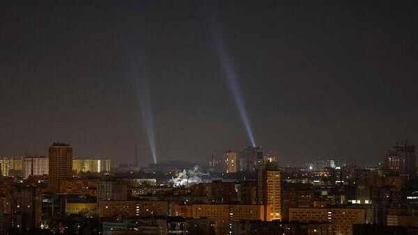 <div class="paragraphs"><p>Ukrainian service personnel use searchlights as they search for drones in the sky over the city during a Russian drone strike, amid Russia's attack on Ukraine, in Kyiv, Ukraine.</p></div>