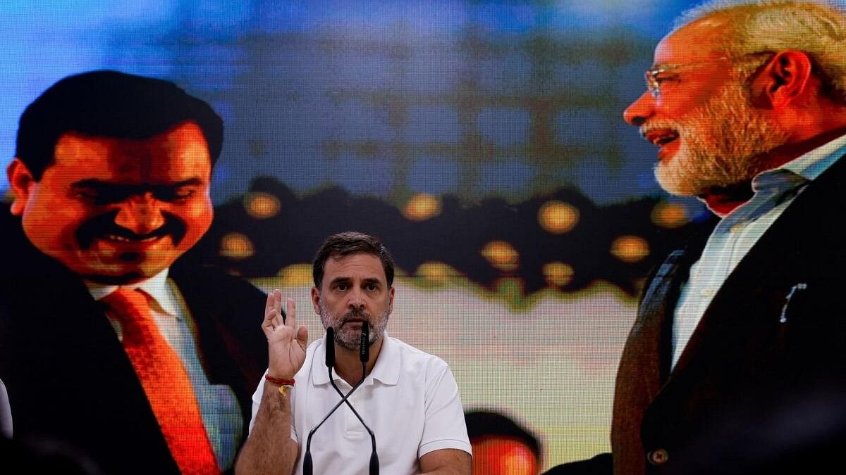 <div class="paragraphs"><p>Rahul Gandhi gestures during a press conference on Gautam Adani being indicted by US prosecutors for his alleged role in a scheme to bribe Indian officials.&nbsp;</p></div>