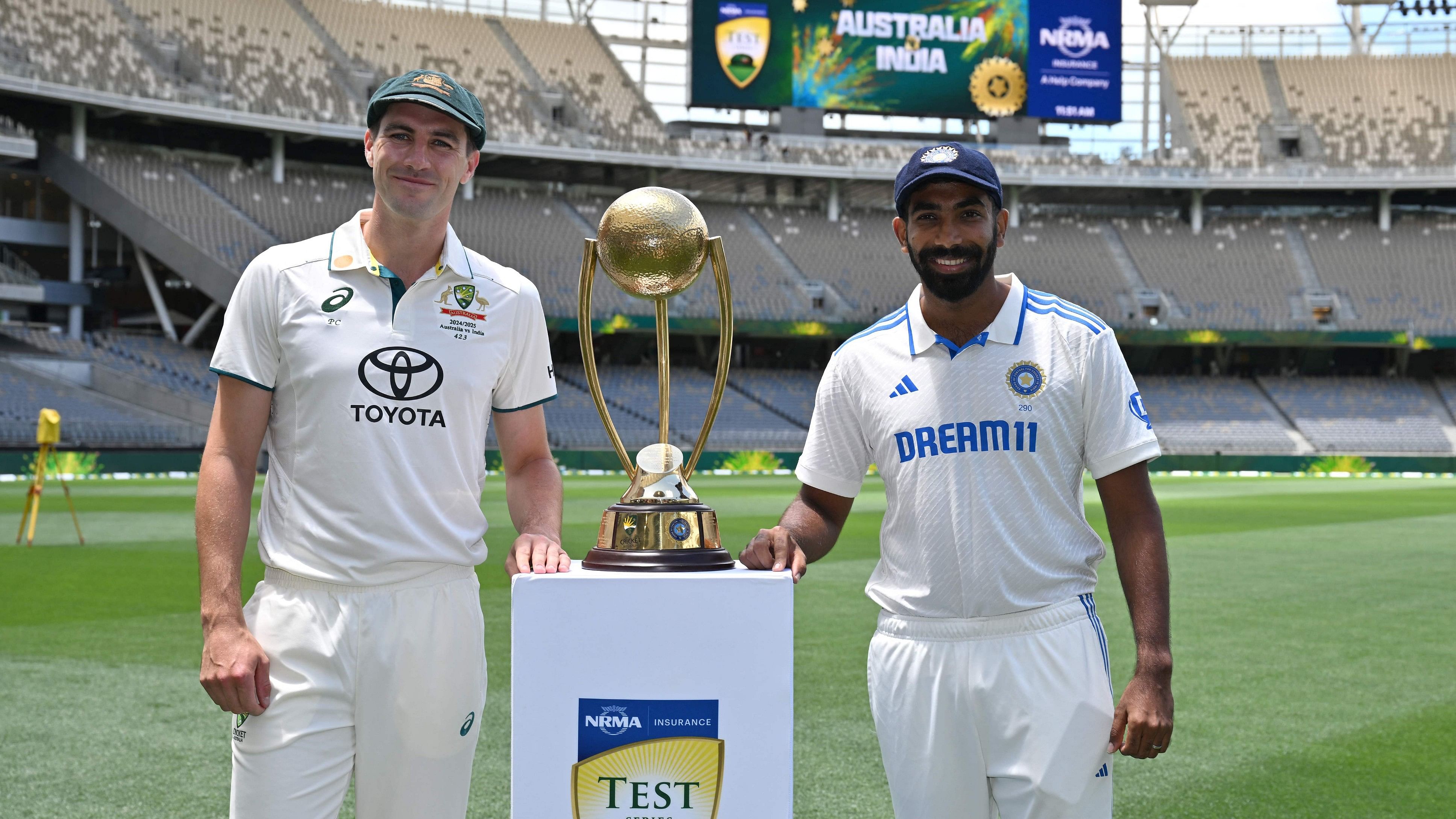 <div class="paragraphs"><p>India captain Jasprit Bumrah (right) and his Australian counterpart Pat Cummins  pose with Border-Gavaskar Trophy on the eve of the first Test at the Optus Stadium in Perth. </p></div>