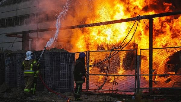 <div class="paragraphs"><p>Firefighters work to put out a fire in a thermal power plant, damaged by a Russian missile strike in Kyiv, Ukraine. File Photo.</p></div>