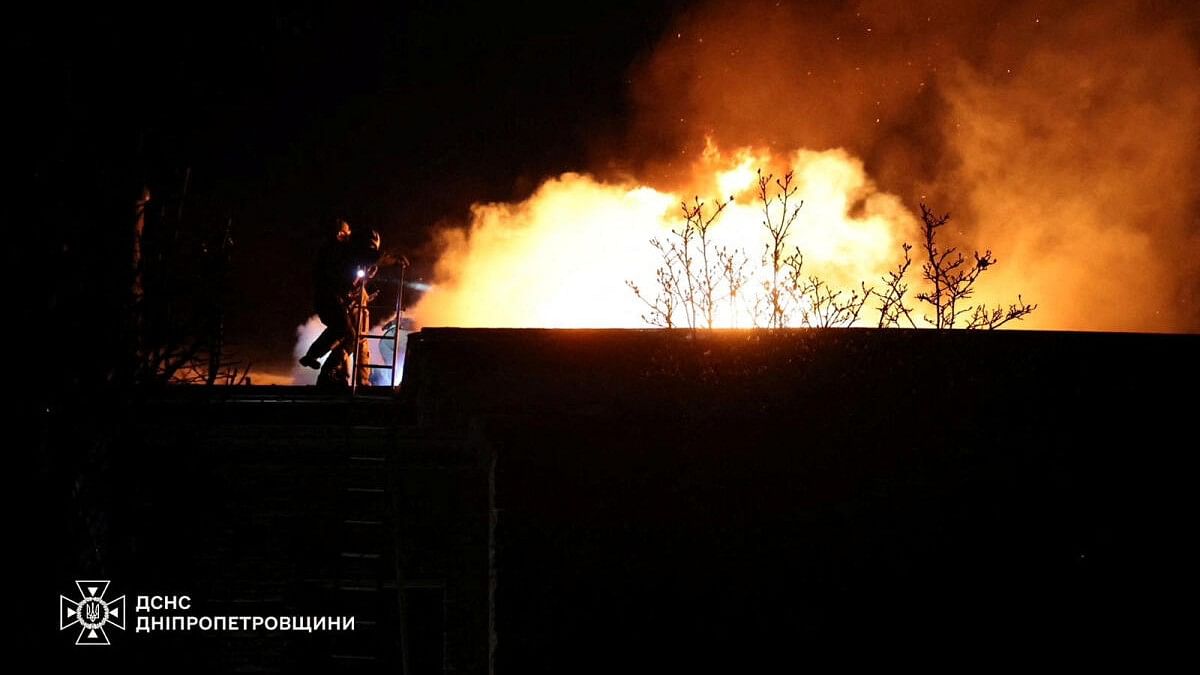 <div class="paragraphs"><p>Firefighters work at the site of a Russian missile strike, amid Russia's attack on Ukraine, in Dnipro.</p></div>