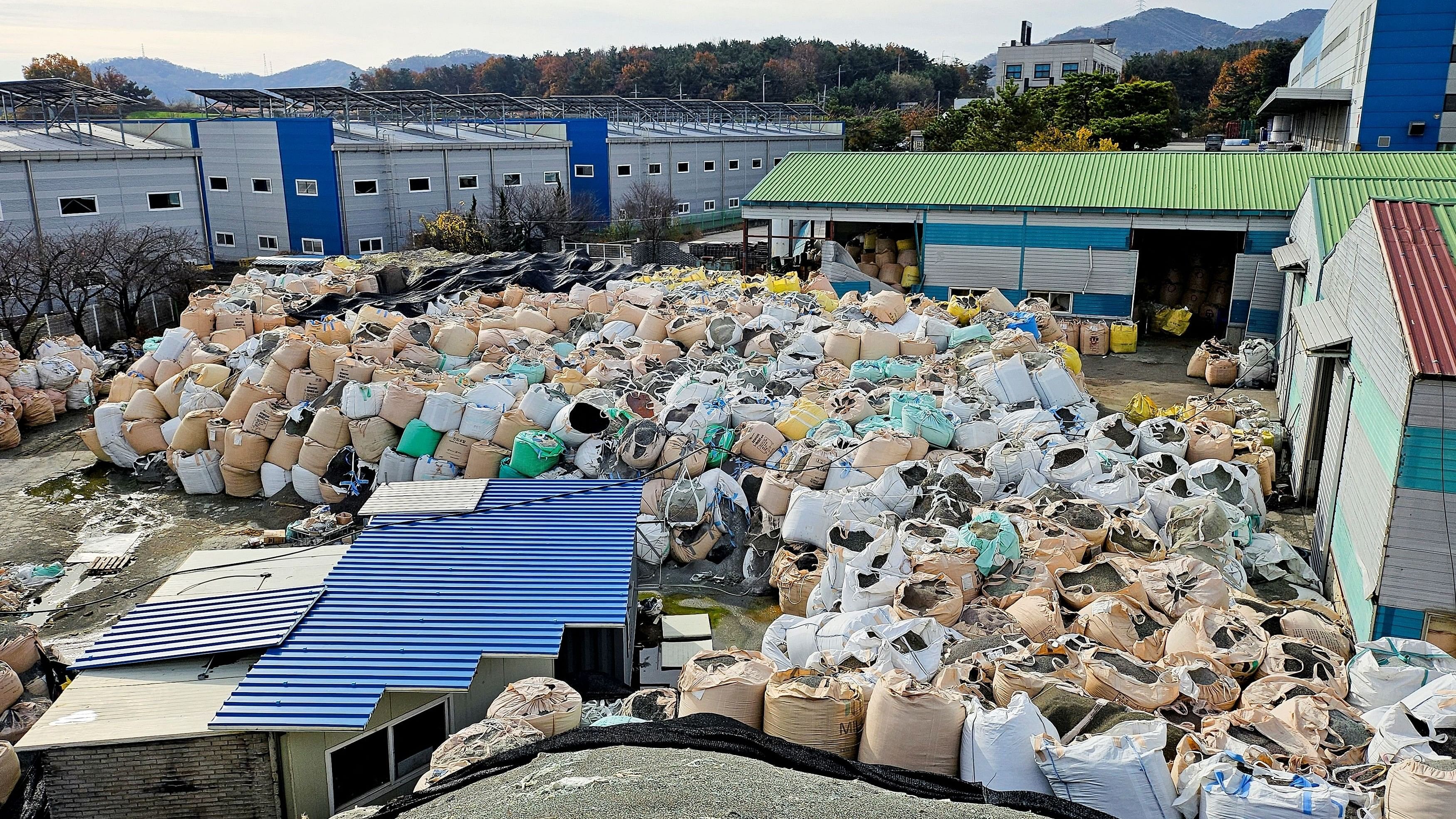 <div class="paragraphs"><p>Sacks of untreated and shredded plastic waste, which is left unattended, are piled at an inoperational recycling site in Asan, South Korea</p></div>