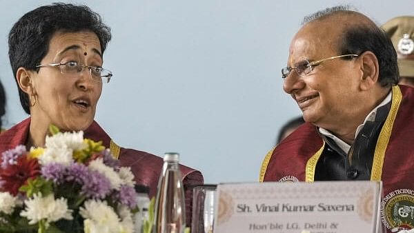 <div class="paragraphs"><p>Delhi Lt. Governor Vinai Kumar Saxena and Chief Minister Atishi during the 7th Convocation of the Indira Gandhi Delhi Technical University for Women (IGDTUW), in New Delhi, Friday.</p></div>