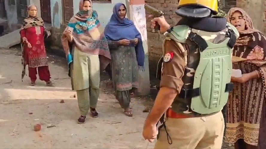 <div class="paragraphs"><p>Muslim woman, who stood before pistol wielding cop during UP bypolls, to be felicitated by SP.&nbsp;</p></div>