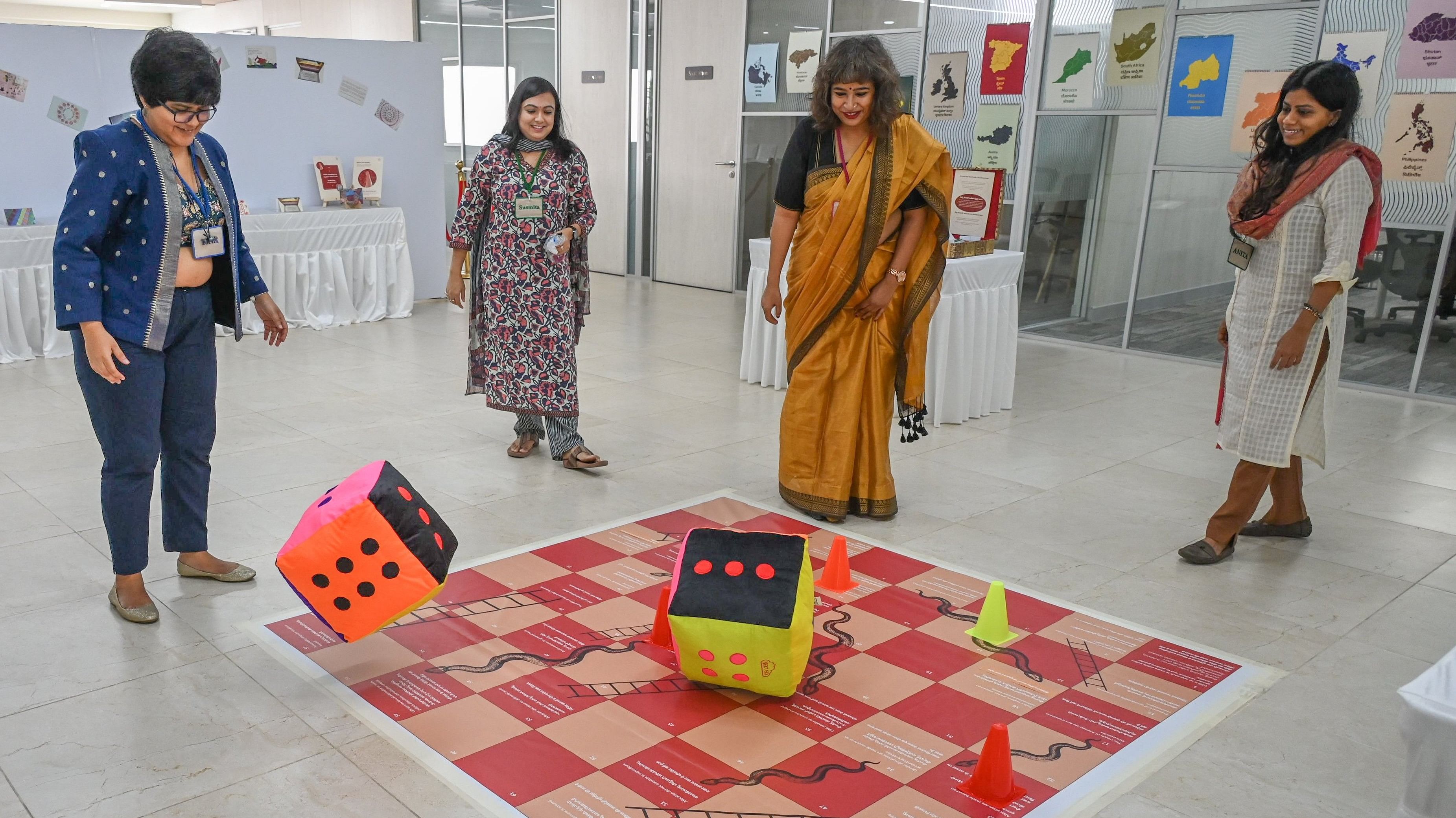 <div class="paragraphs"><p>Delegates play Snakes and Ladders and Roll the Dice at the habba in Bengaluru on Friday. </p></div>