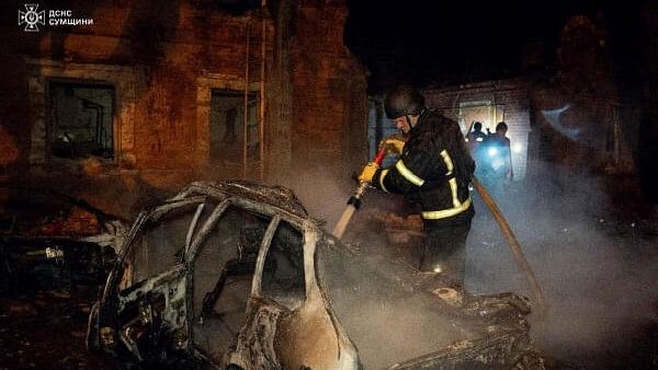 <div class="paragraphs"><p>Firefighters work at a site of a residential area hit by a Russian drone strike, amid Russia's attack on Ukraine, in Sumy, Ukraine November 22, 2024.</p></div>