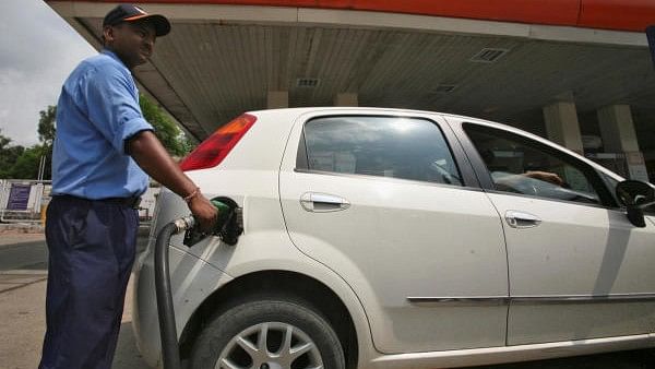 <div class="paragraphs"><p>A worker fills a car with diesel at a fuel station in Jammu. (Representative image)</p></div>