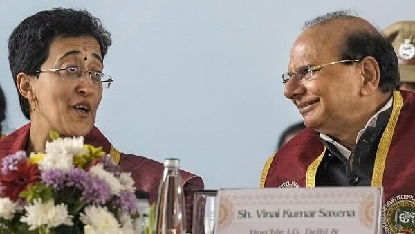 <div class="paragraphs"><p>Delhi Lt. Governor Vinai Kumar Saxena and Chief Minister Atishi during the 7th Convocation of the Indira Gandhi Delhi Technical University for Women (IGDTUW), in New Delhi, on Friday.</p></div>