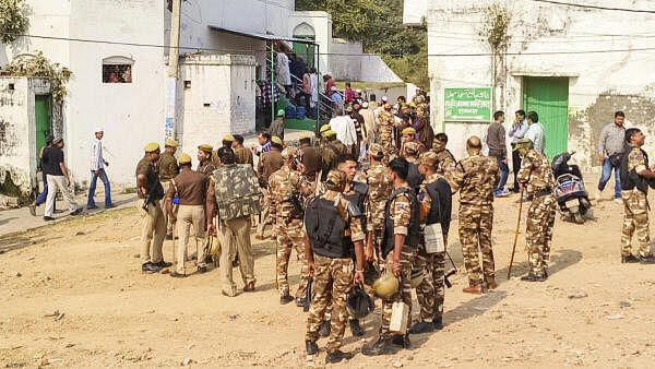 <div class="paragraphs"><p>Security personnel keep vigil ahead of Friday prayers amid the ongoing controversy regarding the Jama Masjid, in Uttar Pradesh's Sambhal district on Friday.</p></div>