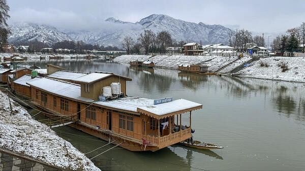 <div class="paragraphs"><p>Representative image showing snow covered houseboats on the Jhelum river after heavy snowfall, in Srinagar.</p></div>