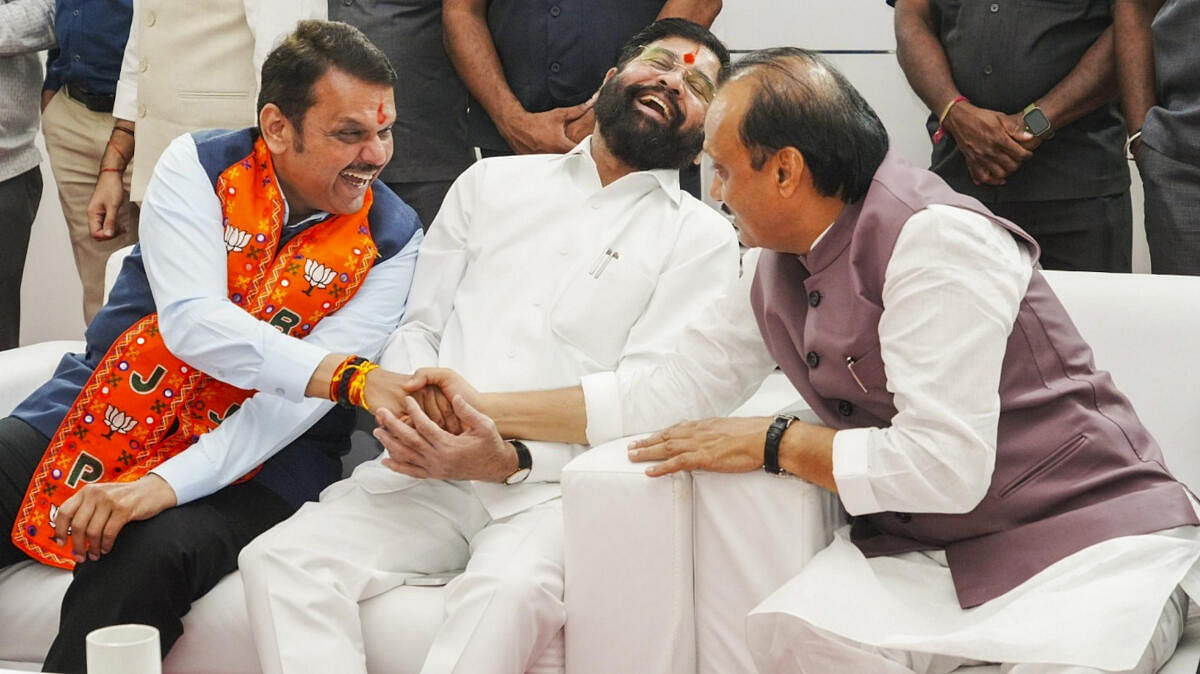 <div class="paragraphs"><p>Maharashtra Chief Minister Eknath Shinde flanked by his deputies Devendra Fadnavis (left) and Ajit Pawar.</p></div>