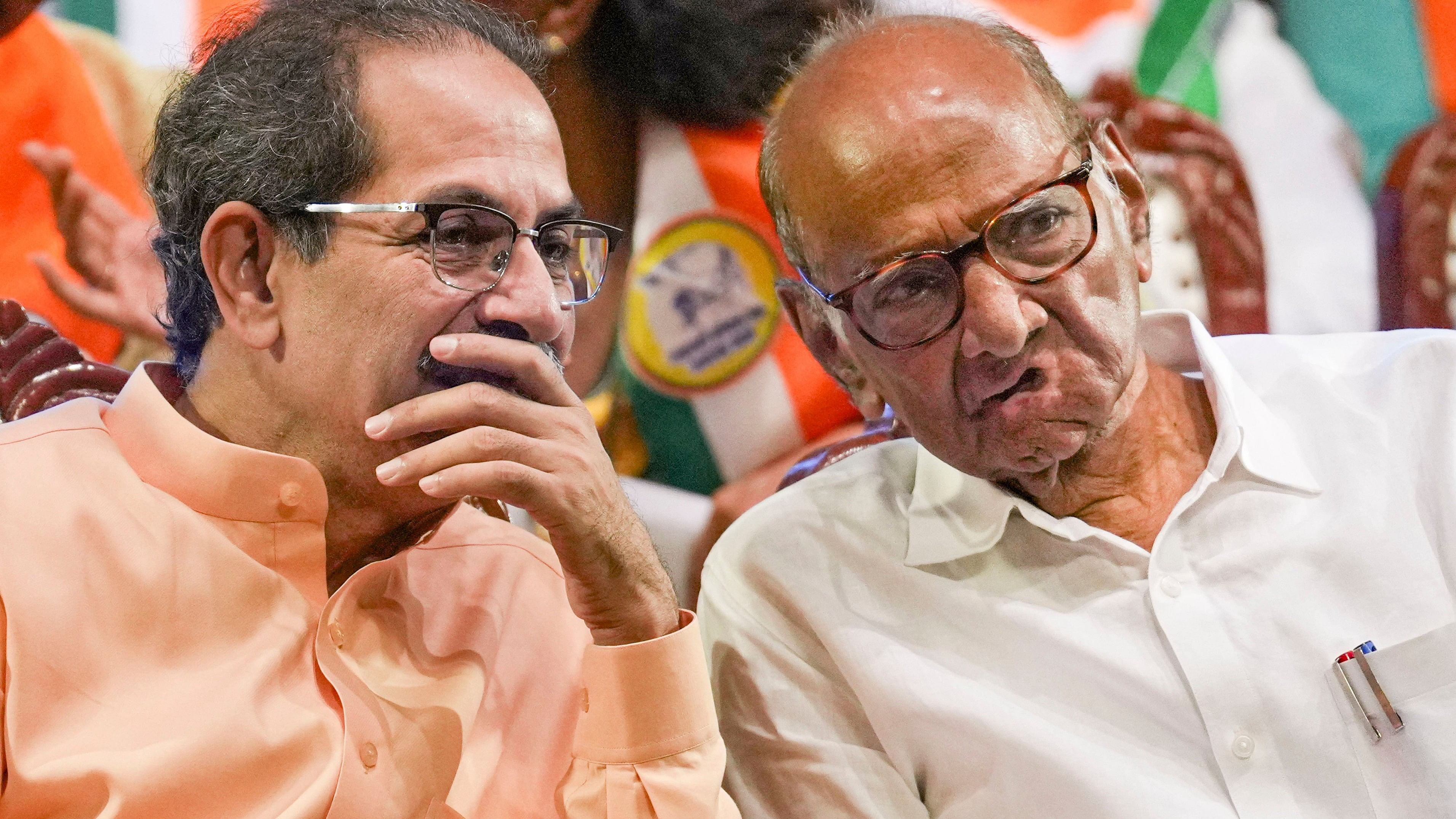 <div class="paragraphs"><p>Shiv Sena (UBT) chief Uddhav Thackeray and NCP (SP) chief Sharad Pawar during the gathering of Maha Vikas Aghadi (MVA) workers and office-bearers ahead of Maharashtra Assembly elections, in Mumbai, Friday, Aug. 16, 2024. </p></div>