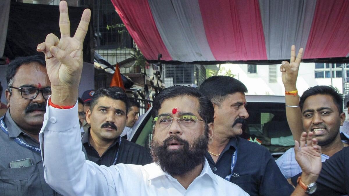 <div class="paragraphs"><p>Eknath Shinde flashes the victory sign after Maya Yuti's resounding win in Maharashtra.&nbsp;</p></div>