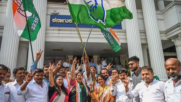 <div class="paragraphs"><p>Congress members celebrate in Bengaluru after party swept the by-polls to three Assembly segments on Saturday</p></div>