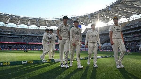 <div class="paragraphs"><p>Australia players walk off at the end of play.&nbsp;</p></div>