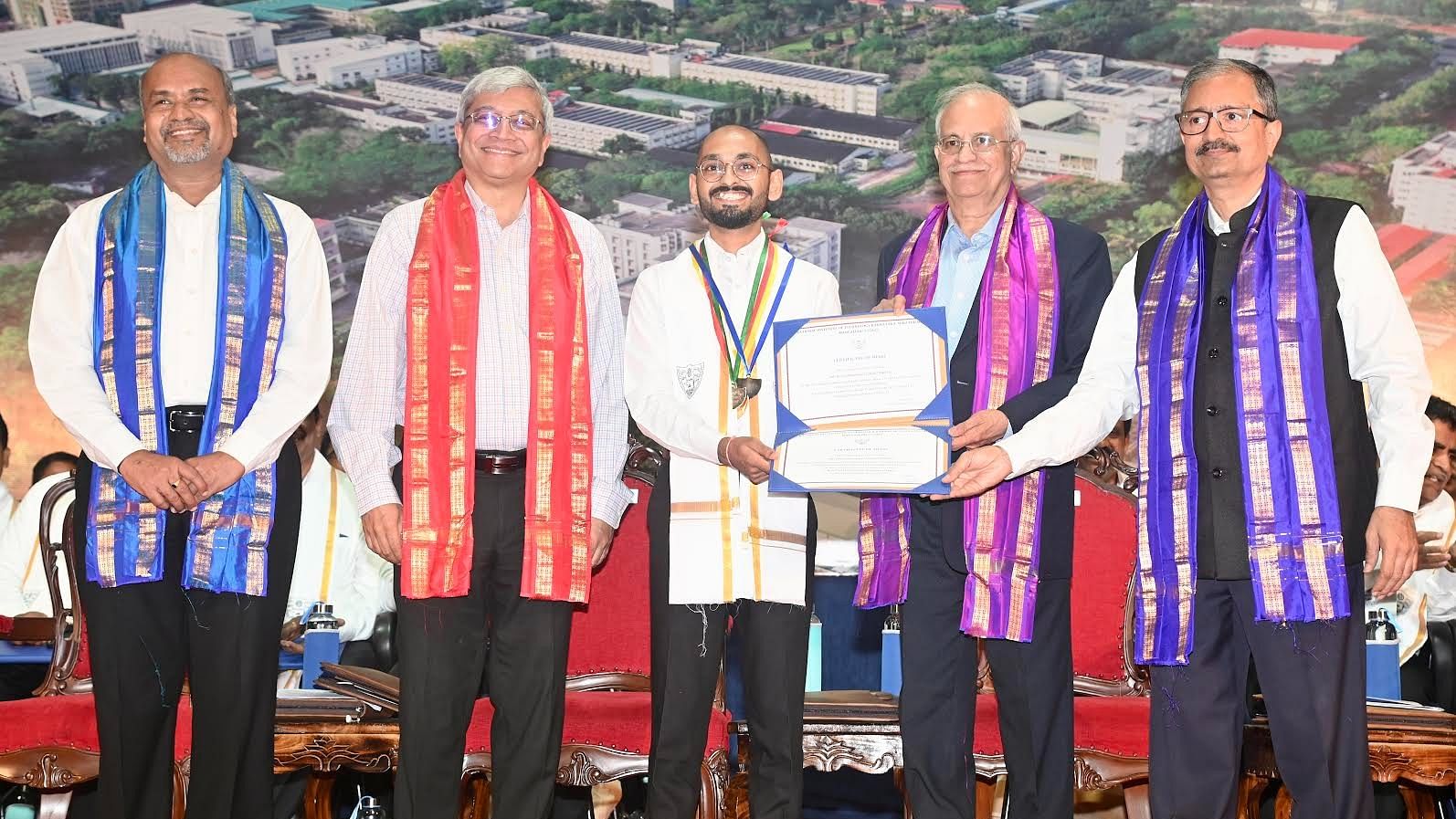 <div class="paragraphs"><p>Prerit Sharma, post graduate in Thermal Engineering receives medal from Indian Institute of Science (IISc) Bengaluru Director Prof Govindan Rangarajan and Dr Bhujanga Rao Vepakomma, Chairman, KIMS Foundation and Research Centre during the 22nd annual convocation at NITK, Surathkal on Saturday.</p></div>