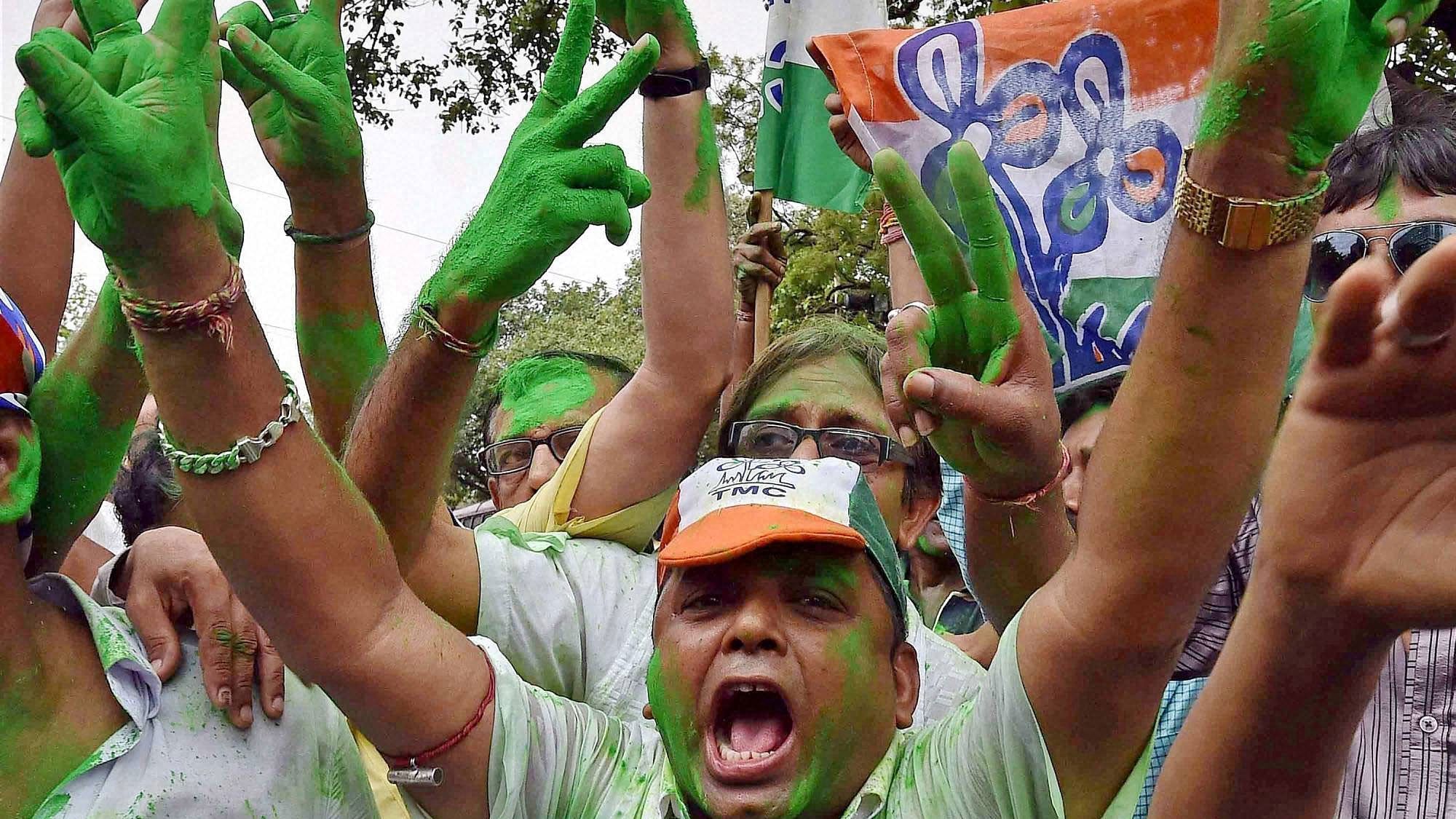 <div class="paragraphs"><p>Trinamool Congress workers celebrating.</p></div>