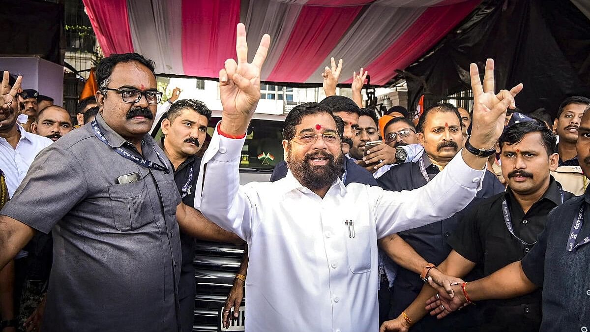 <div class="paragraphs"><p>Eknath Shinde flashes the victory sign after his win in&nbsp;Kopri-Pachpakhadi constituency.&nbsp;</p></div>