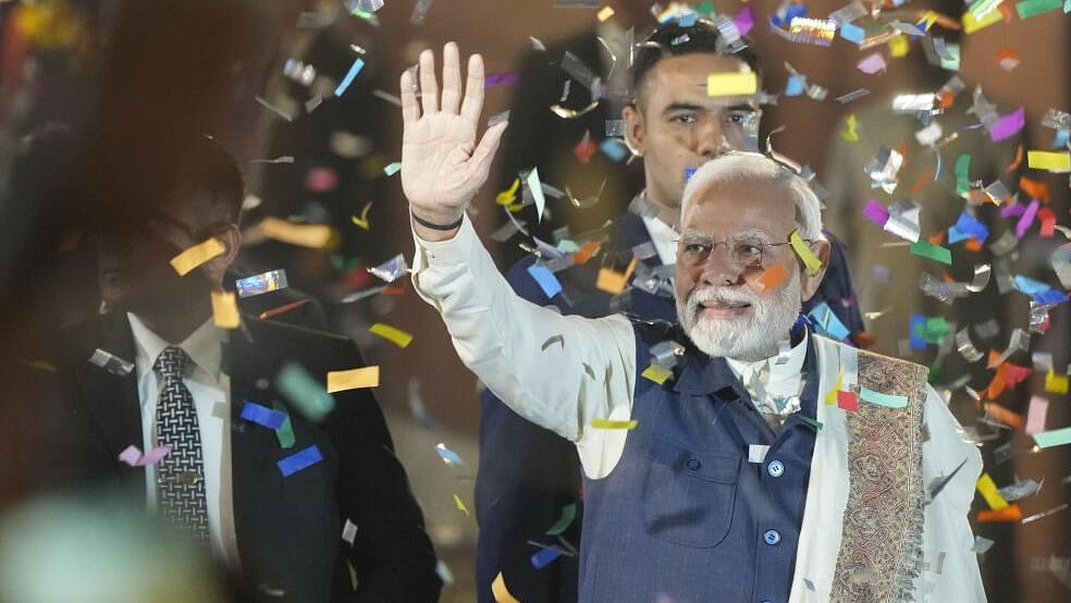 <div class="paragraphs"><p>PM Narendra Modi waves to the crowd during BJP’s celebrations at the party's headquarters in New Delhi.&nbsp;</p></div>