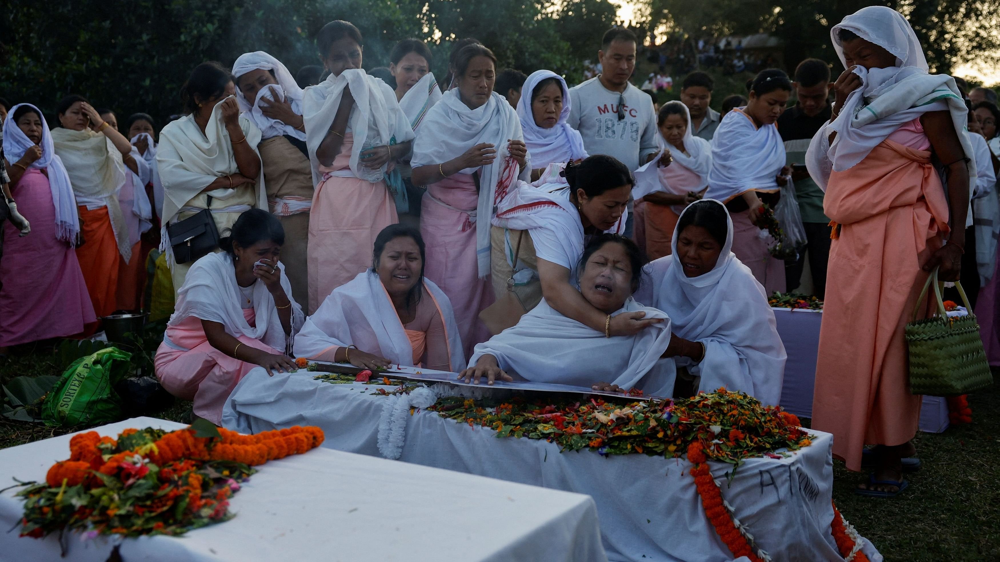 <div class="paragraphs"><p>A woman mourns the death of her son Khundrakpam Athouba, who was killed after ethnic violence broke out in Borobekra, during a funeral in Jiribam in the northeastern state of Manipur, India, November 22, 2024.</p></div>