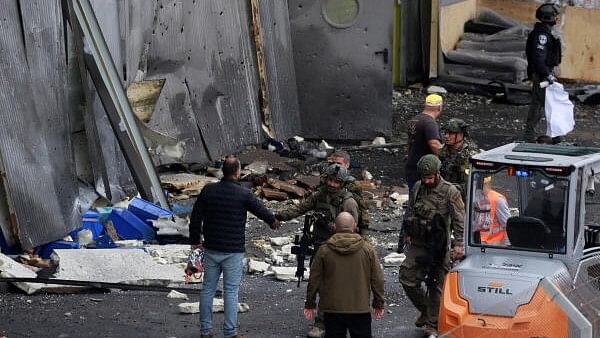 <div class="paragraphs"><p>A general view of the scene where a projectile fell after Israel's military reported a barrage of projectiles crossing over to Israel from Lebanon, amid cross-border hostilities between Hezbollah and Israel, in Maalot-Tarshiha, northern Israel, November 24,</p></div>