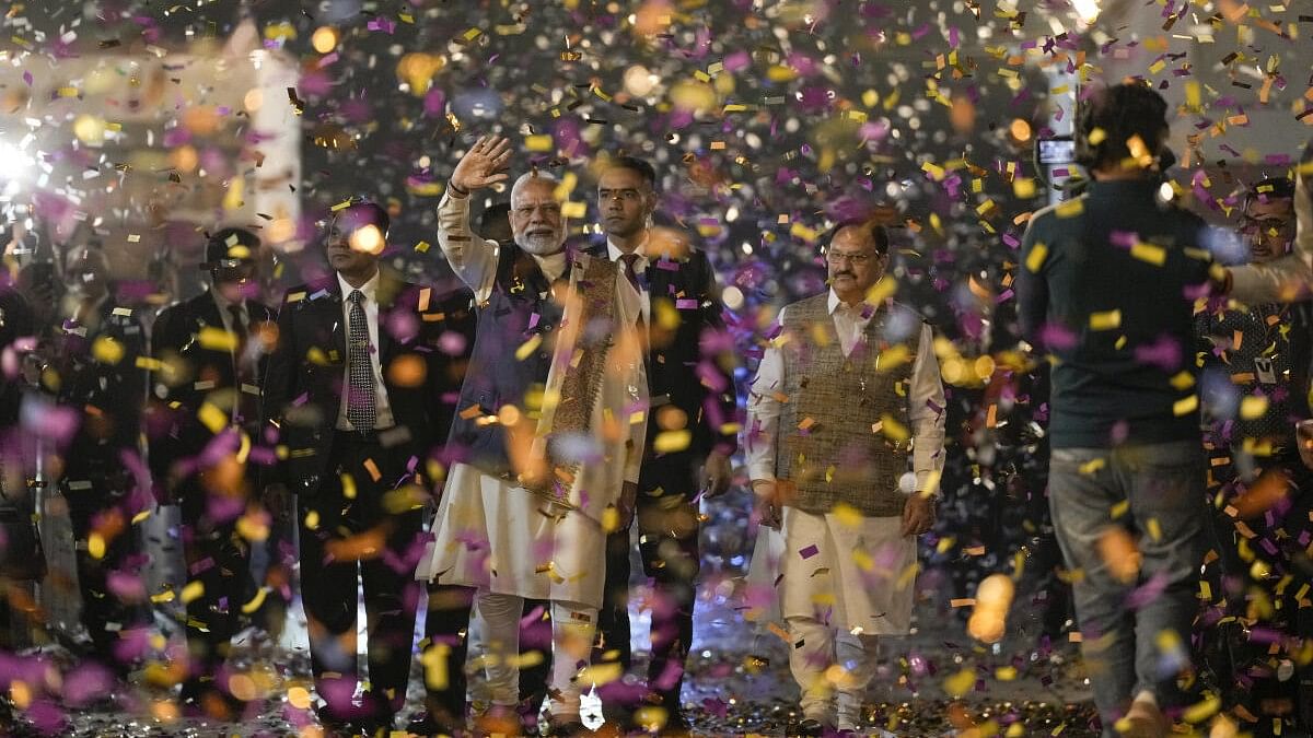 <div class="paragraphs"><p>Prime Minister Narendra Modi with Union Minister and party National President JP Nadda during celebration of the party's victory in the Maharashtra Assembly elections and in several bypolls, at BJP headquarters in New Delhi</p></div>