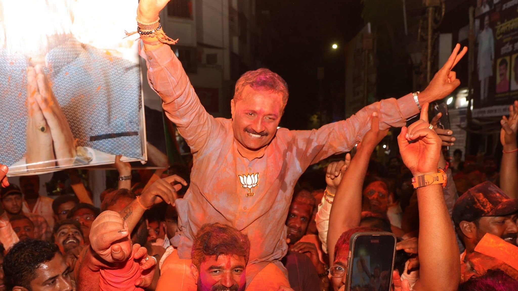 <div class="paragraphs"><p>BJP's&nbsp;Hemant Rasane, who won in Kasba Peth, celebrating.</p></div>