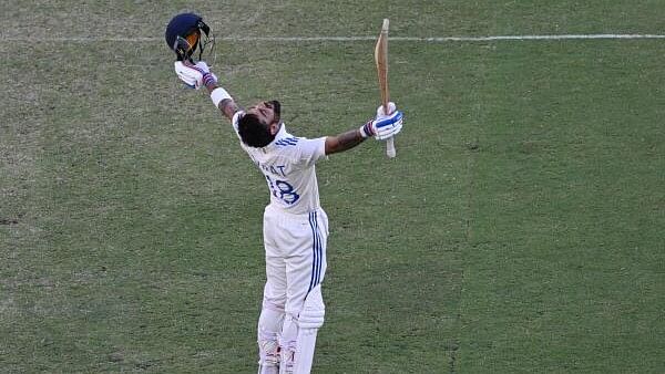 <div class="paragraphs"><p>India's Virat Kohli celebrates after reaching his century Dean Lewins</p></div>