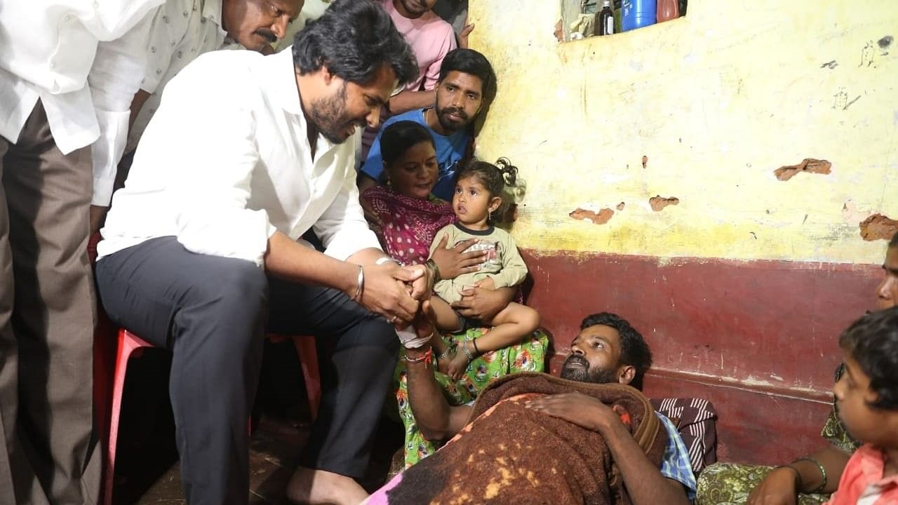 <div class="paragraphs"><p>Channapatna JD(S) candidate Nikhil Kumaraswamy consoles Manjunath, a resident of Srirampura, who had tried to end his life after the former lost the byelection.</p></div>