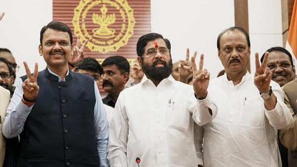 <div class="paragraphs"><p>Maharashtra Chief Minister Eknath Shinde with Deputy Chief Ministers Devendra Fadnavis and Ajit Pawar flashes victory sign during a press conference as the BJP-led Mahayuti alliance secures victory amid the counting of votes for the Maharashtra Assembly elections, in Mumbai, Saturday.&nbsp;</p></div>