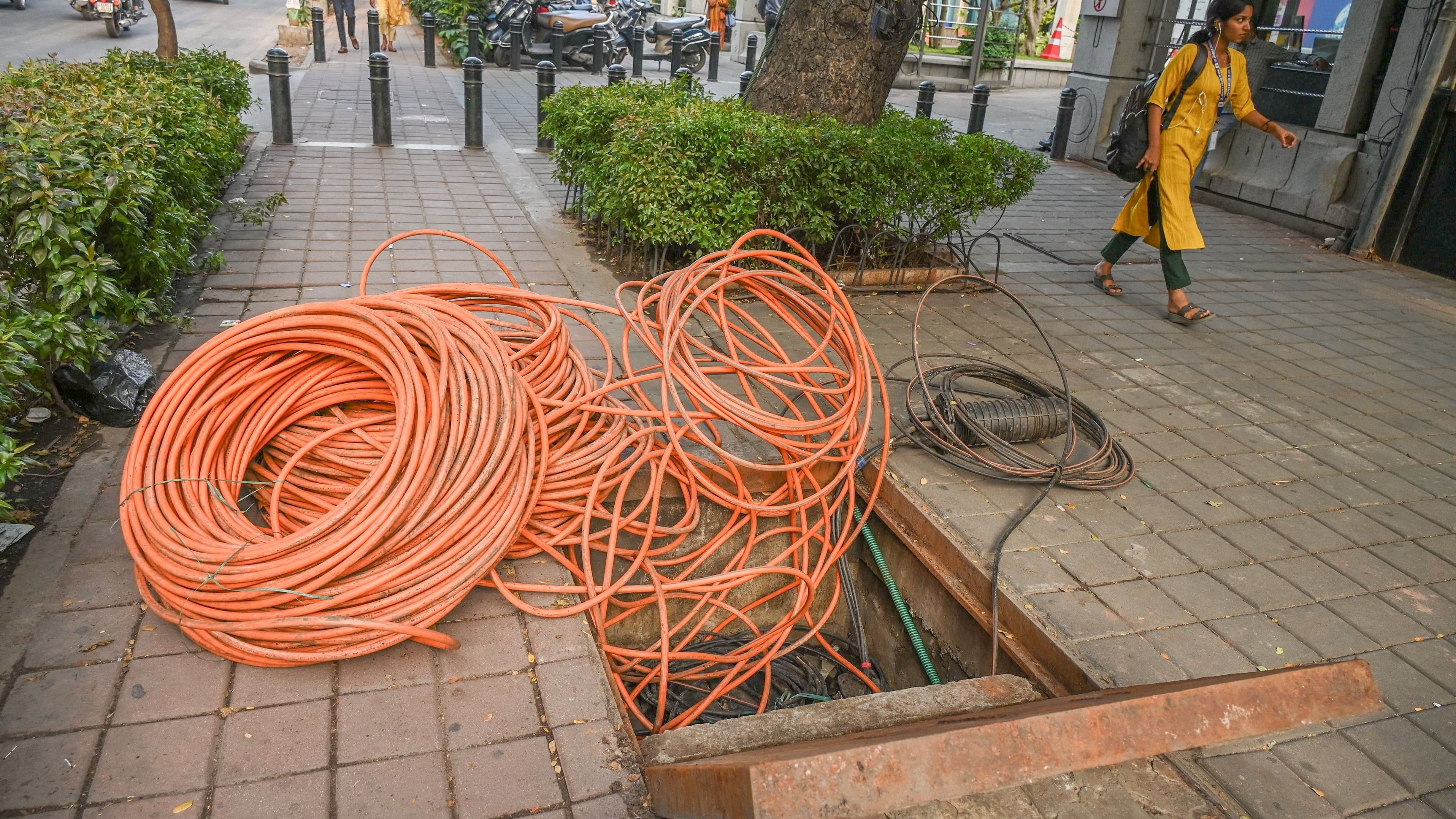 <div class="paragraphs"><p>Optical fibre cables on footpaths can cause problems for pedestrians and motorists. This is at&nbsp;Residency Road. </p></div>