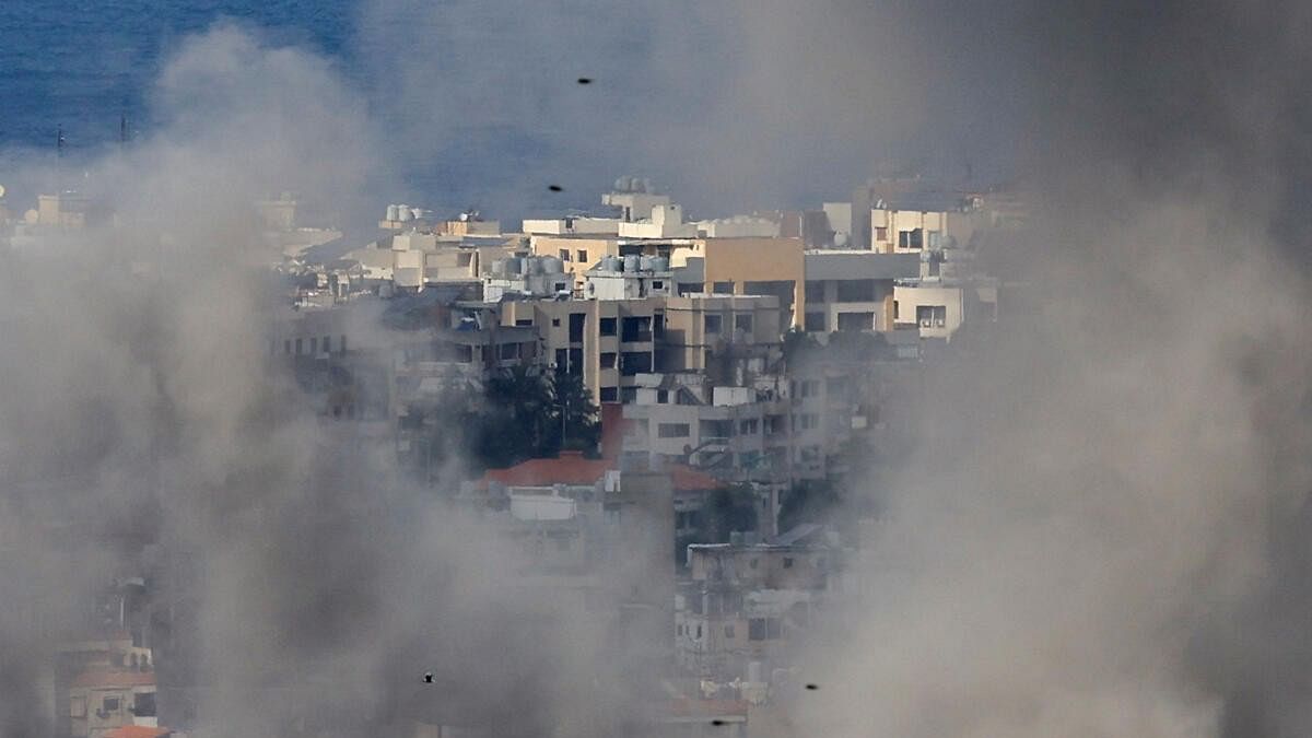 <div class="paragraphs"><p>Smoke billows over Beirut's southern suburbs after Israeli strike, as seen from Baabda.</p></div>