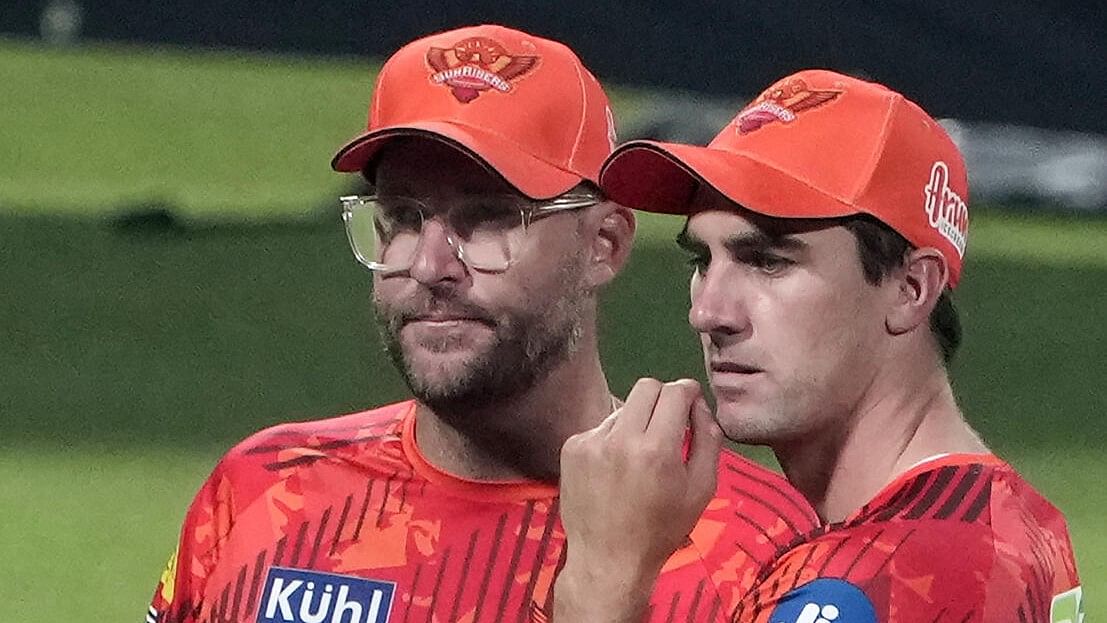 <div class="paragraphs"><p>SRH skipper Pat Cummins with coach Daniel Vettori.</p></div>