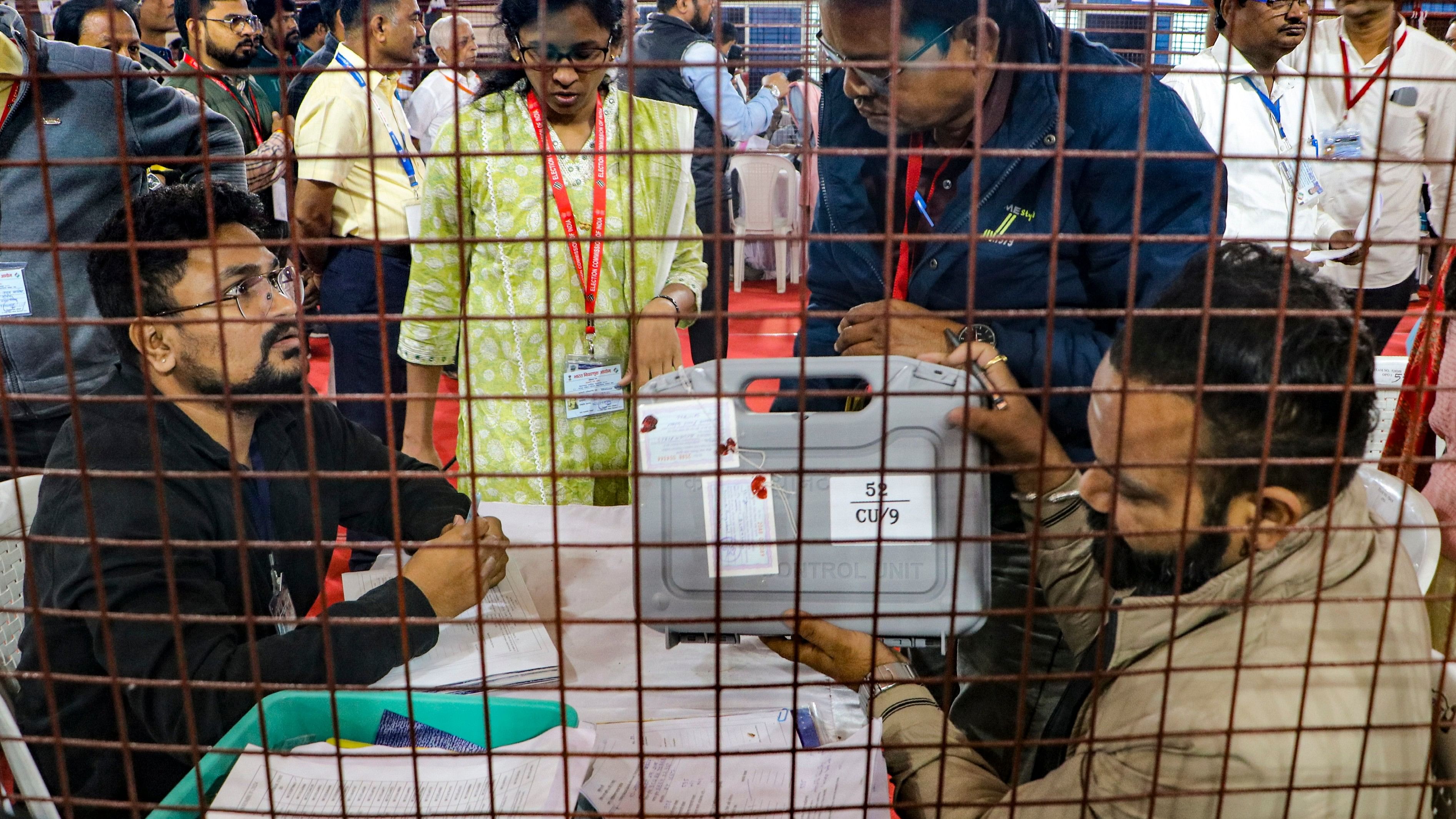 <div class="paragraphs"><p>Polling officials at a counting center amid the counting of votes for the Maharashtra Assembly elections, in Nagpur, Saturday, Nov. 23, 2024. </p></div>