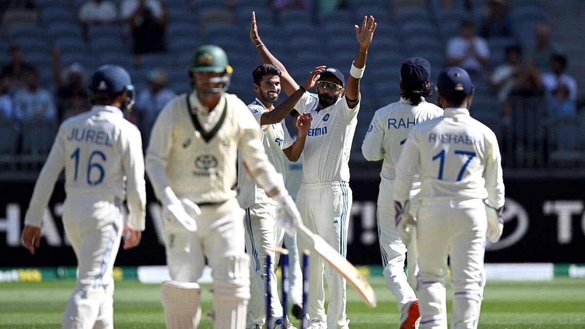 <div class="paragraphs"><p>India's Washington Sundar celebrates the wicket of Australia's Nathan Lyon.</p></div>