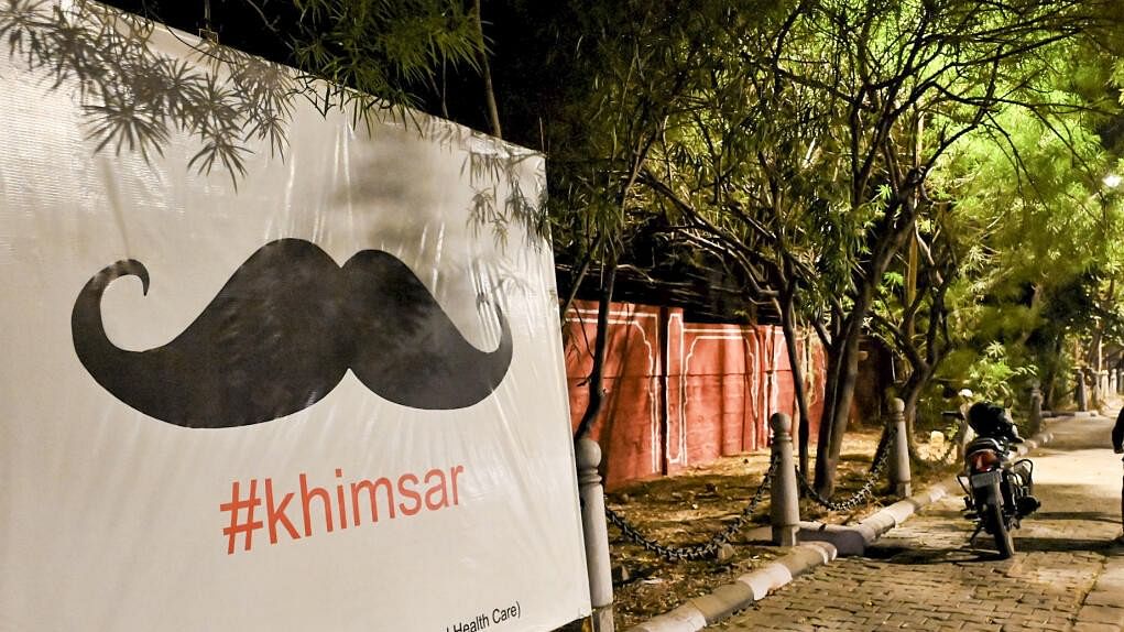 <div class="paragraphs"><p>Jaipur: Mustache hoarding placed outside the residence of Rajasthan minister Gajendra Singh Khimsar after BJP won 5 seats in bypolls election, at Civil lines in Jaipur.</p></div>