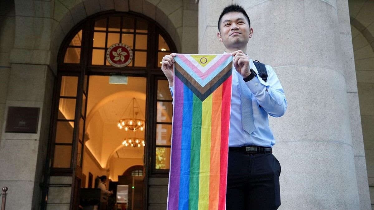 <div class="paragraphs"><p>Nick Infinger holds intersex-inclusive pride progress flag after top court rules in favour of equal housing and inheritance rights for same-sex couples in Hong Kong.&nbsp;</p></div>