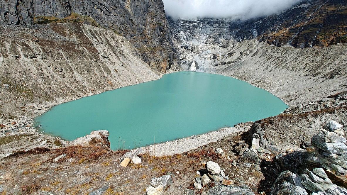 <div class="paragraphs"><p>A turquoise glacial lake nestled in the Himalayan mountain.</p></div>