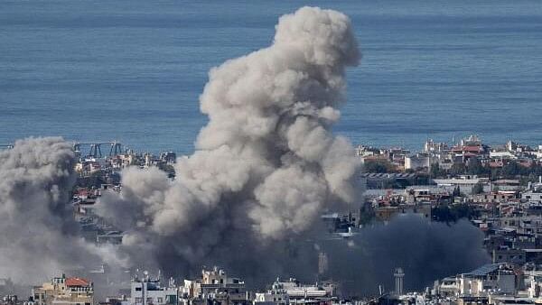 <div class="paragraphs"><p>Smoke billows over Beirut's southern suburbs, after an Israeli strike, amid the ongoing hostilities between Hezbollah and Israeli forces, as seen from Baabda, Lebanon.</p></div>