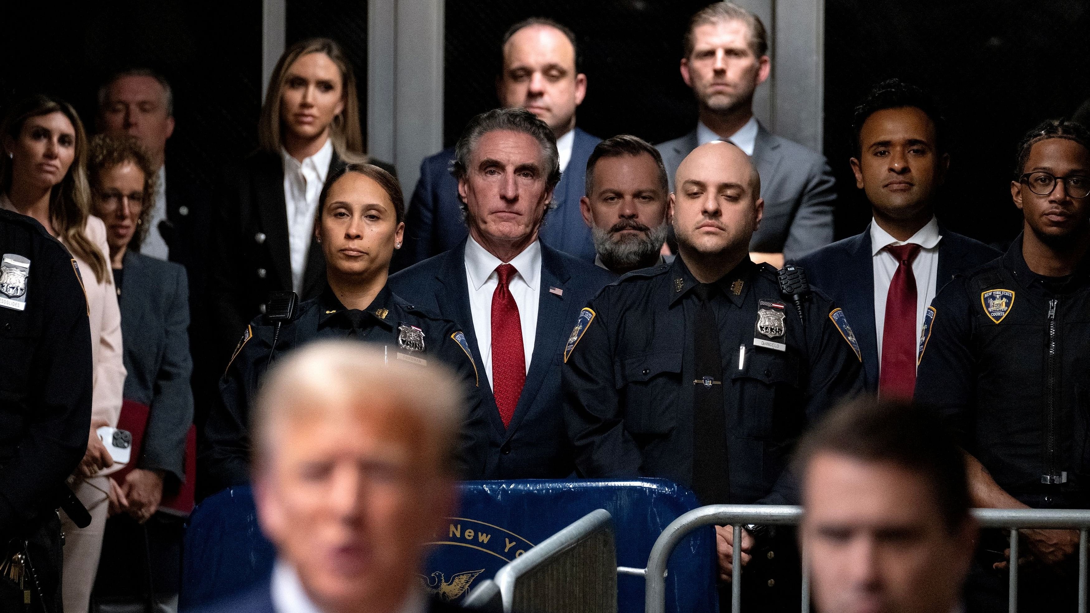 <div class="paragraphs"><p>Republican North Dakota Governor Doug Burgum (C), Republican Rep. Cory Mills, R-Fla., center right and businessman Vivek Ramaswamy, second from right, listen as Trump speaks after court proceedings ended for the day in his trial at Manhattan criminal court.</p></div>