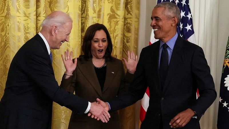 <div class="paragraphs"><p>US President Joe Biden greets former President Barack Obama during an event on the Affordable Care Act, the former president's top legislative accomplishment, as Vice President Kamala Harris reacts in the East Room at the White House in Washington, US.</p></div>