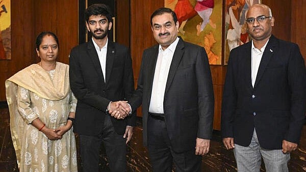 Youngest world chess champion Gukesh meets Gautam Adani